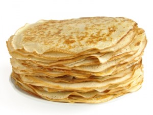 pancakes pile against white background